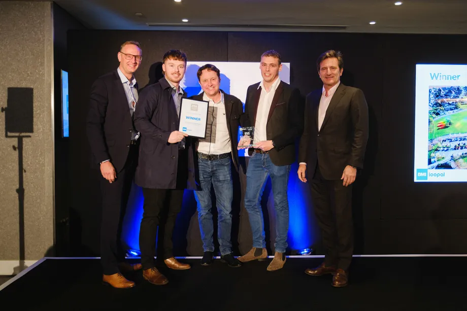 Tucker and Tunstalls Roofing Ltd collecting the award