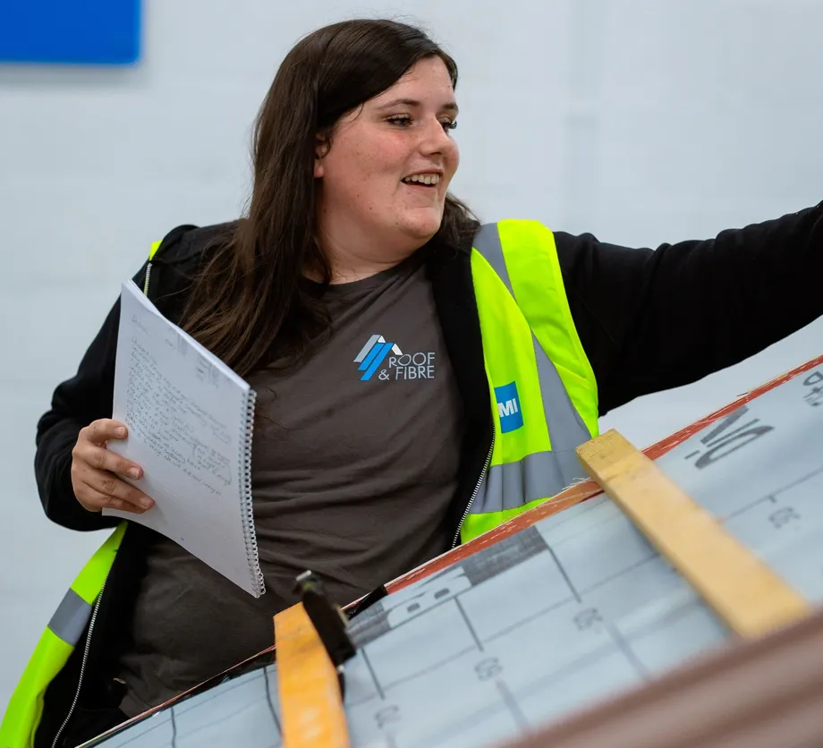 Leah Stewart shows defects on the pitched roof rig