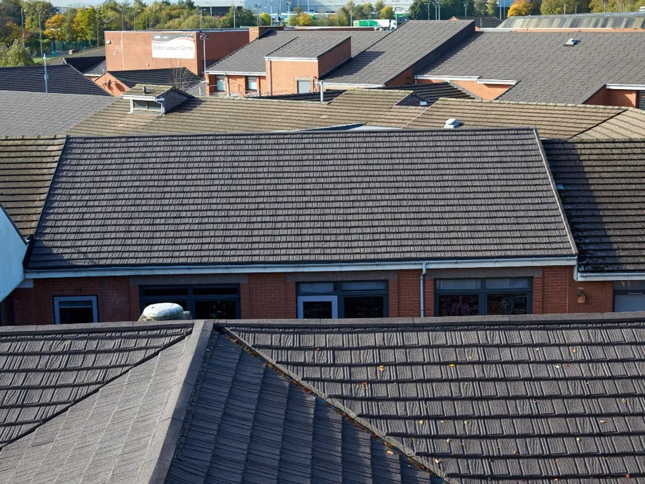Sutton Academy pitched roof Aerodek impact