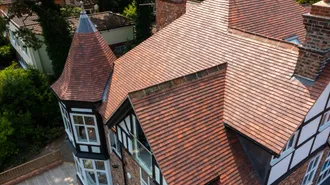 The Gables - Plain Tile - Rosemary Clay Classic Medium Mixed Brindle roof tile on period roof with turret, hips, valleys, ridges